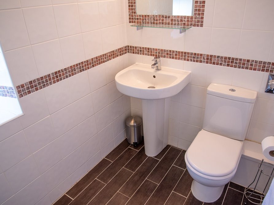 Bathroom in converted barn at Rushop Hall, the Peak District