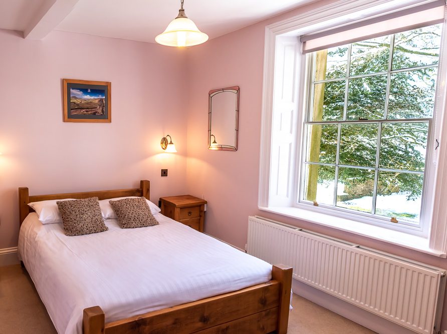 En suite bedroom in Rushop Hall farmhouse, the Peak District