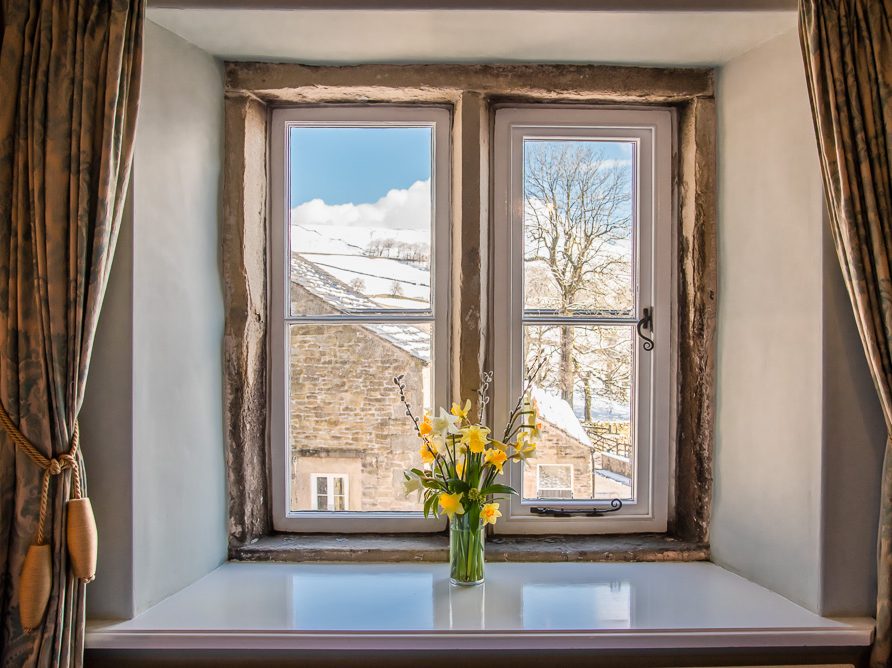 View over farm from en suite bedroom in Rushop Hall farmhouse