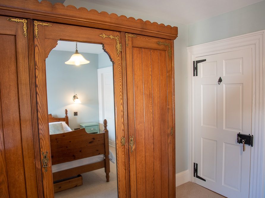 En suite bedroom in Rushop Hall farmhouse