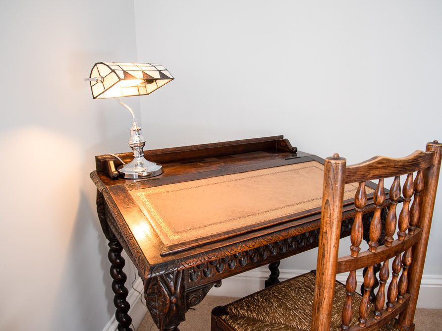 Guest room with en suite bathroom in the Rushop Hall farmhouse