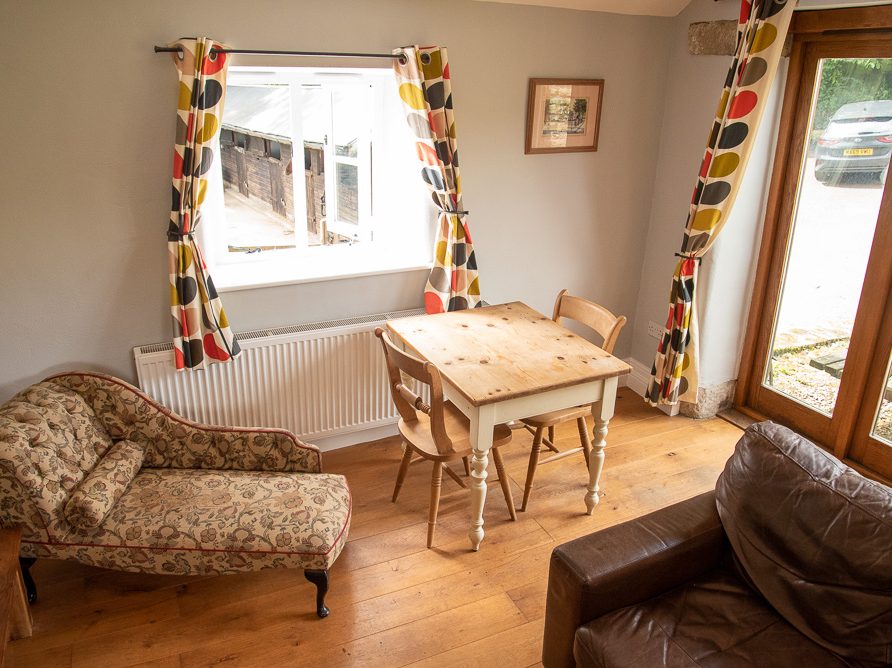 Living room in the Irishman's cottage at Rushop Hall