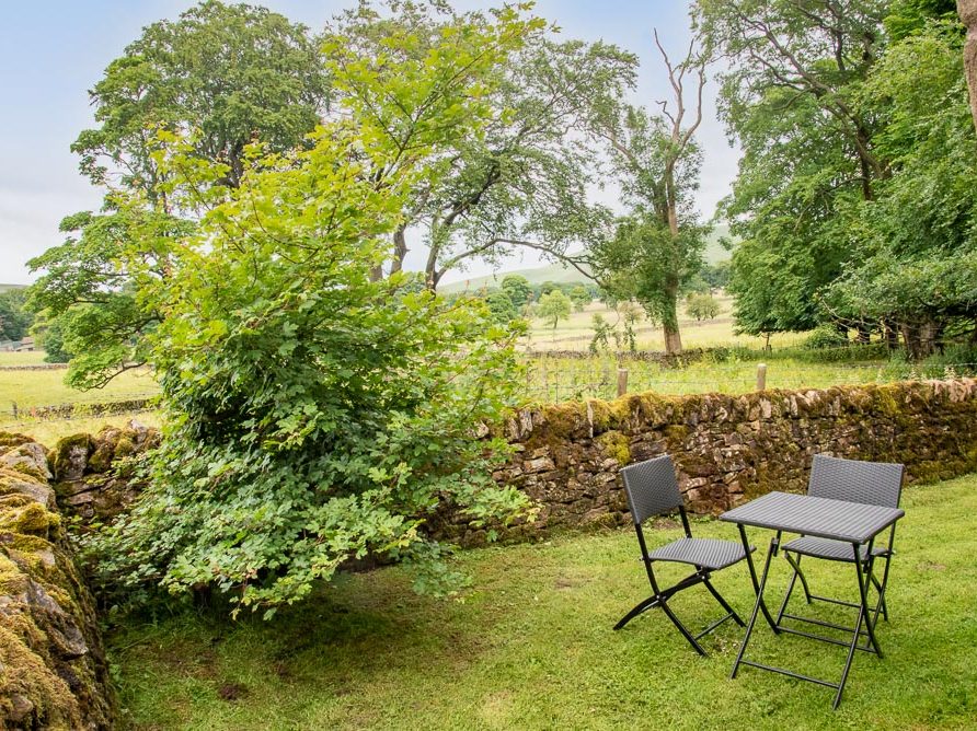 Outdoor seating at Rushop Hall Irishman's cottage